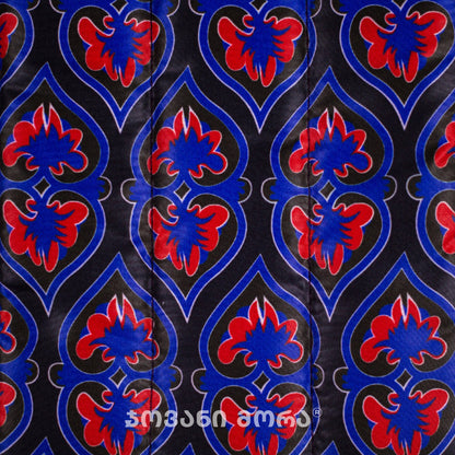 Close-up of Affection Georgian ornament print on padded laptop sleeve