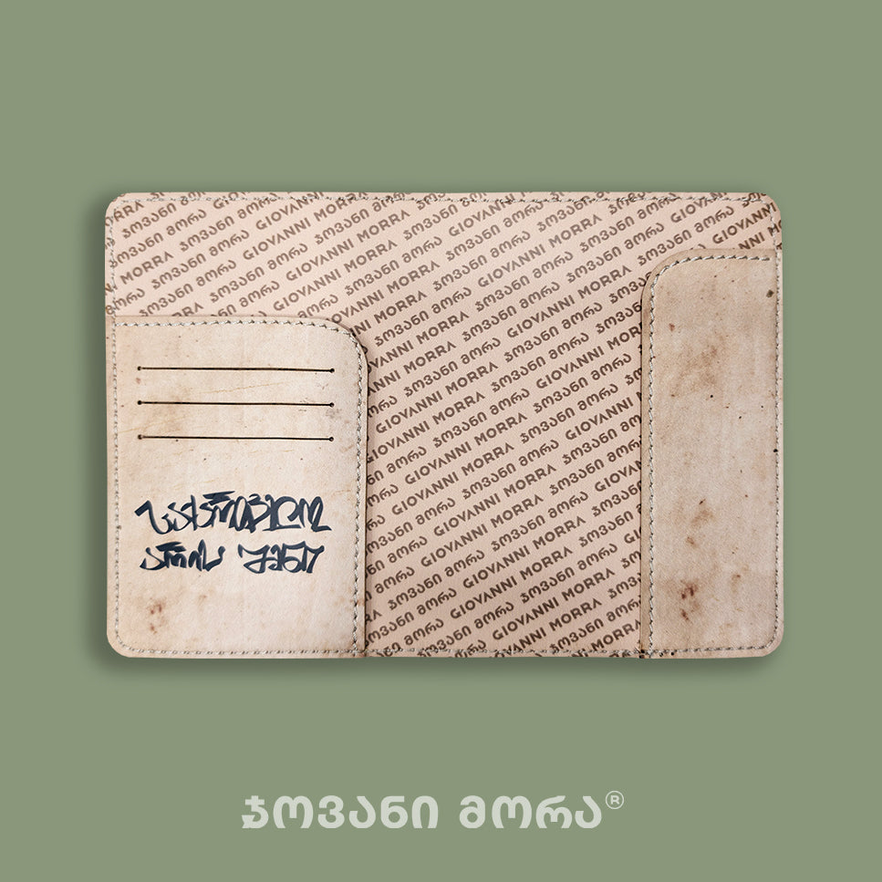Inside view of beige Avtandili passport holder with Giovanni Morra lining