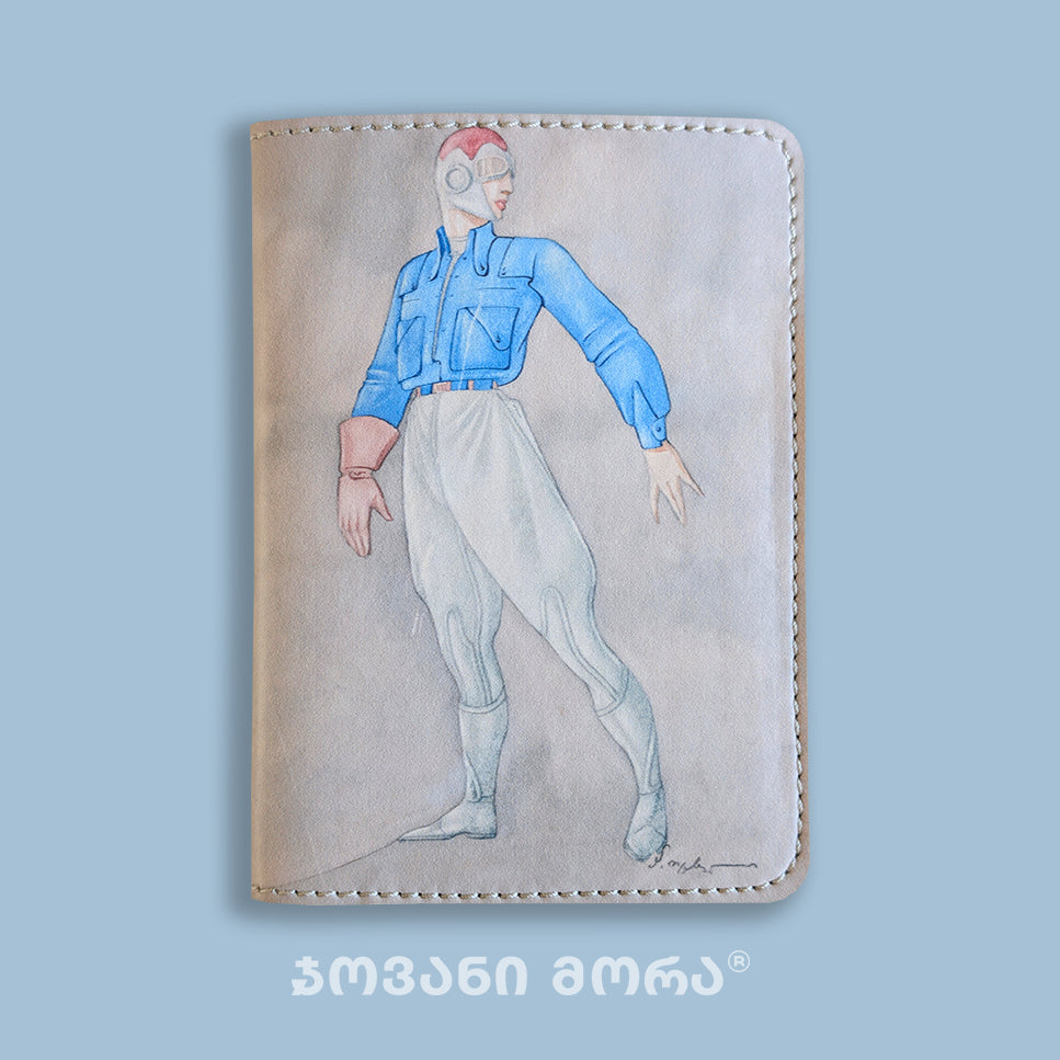Folded blue vegan leather passport holder with Flying Painter illustration by Giovanni Morra